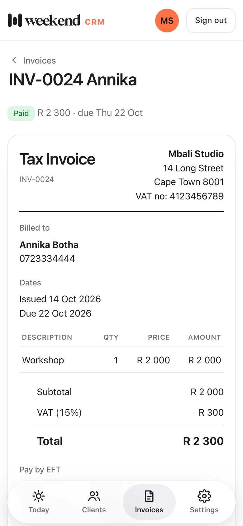 A tax invoice marked Paid, with line items, VAT and the total.